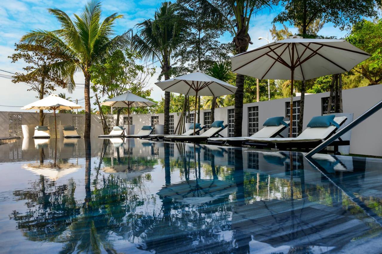 The Blossom Hoi An Ocean Front Hotel & Spa Exterior photo